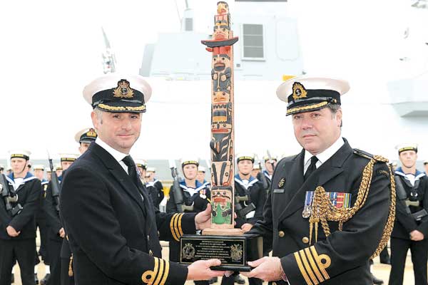 Island-made totem pole honours Commonwealth connection