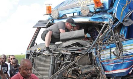 HMCS Regina crew members aid accident victim