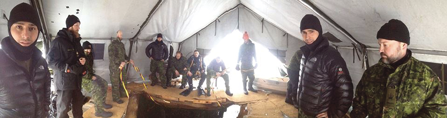 Dive unit explores depths of a frozen lake for training