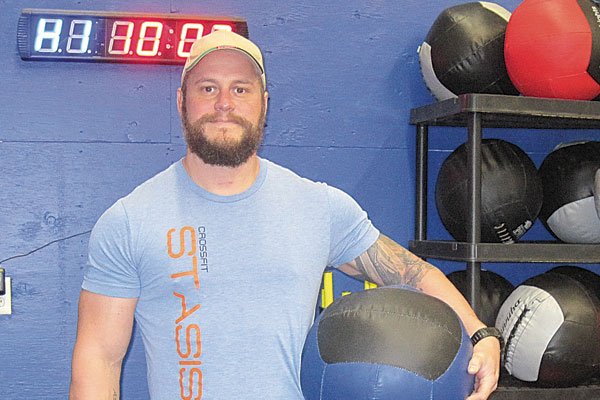 Retired military member turns fitness into a new business: CrossFit Stasis