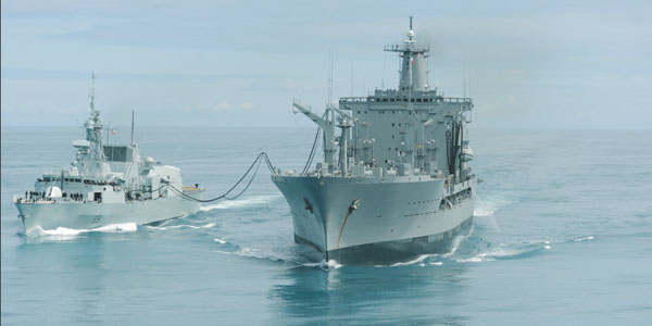 Chilean replenishment ship trains with RCN
