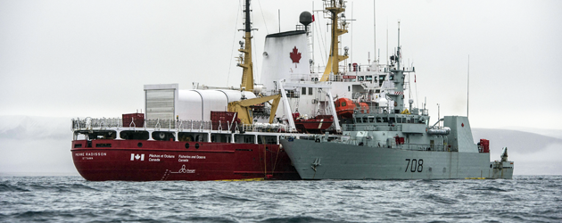 Alongside the Coast Guard