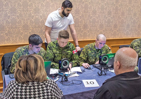 Army reservists welcome refugees