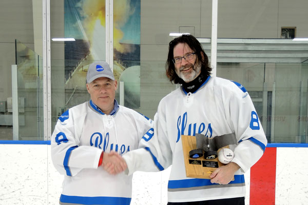 Babcock retains hockey title
