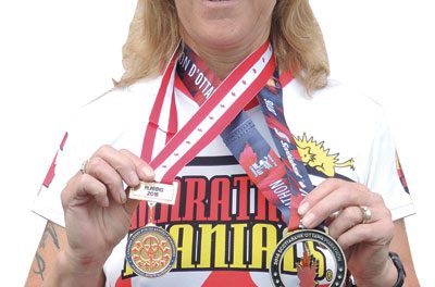 Marathon runner beats Ottawa heat to earn gold