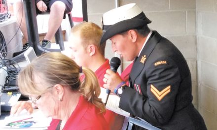 Tritons shortstop announces world softball play