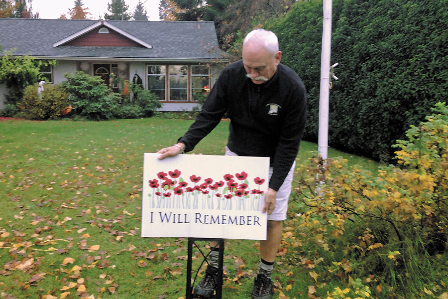 Signage promotes Remembrance Day and HMCS Alberni Museum in Comox