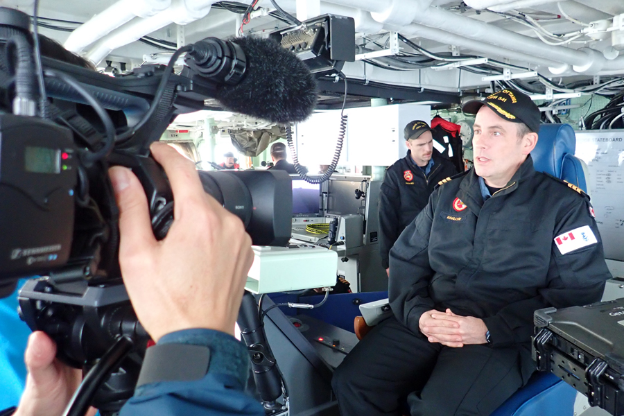 Chinese language TV crew document navy life