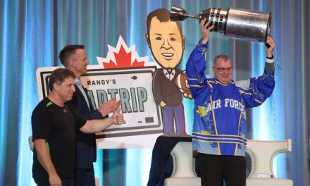 Mini Grey Cup lands in NFL hands