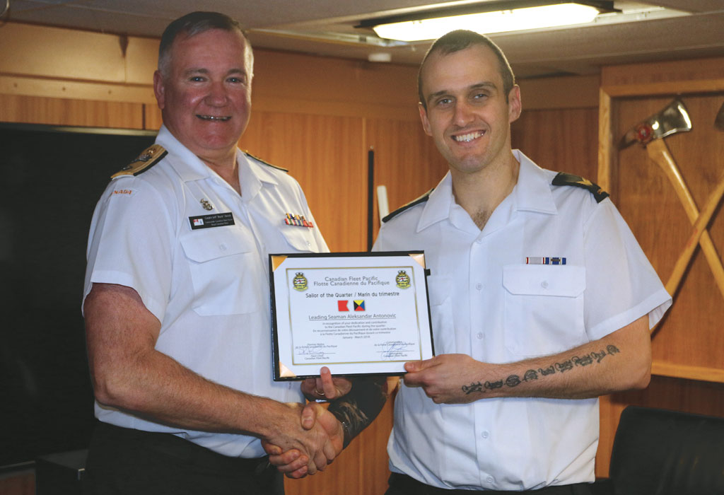 Leading Seaman Aleksandar Antonovic is awared the Canadian Fleet Pacific’s Sailor of the Quarter for Q4 2017 from Cmdre Zwick