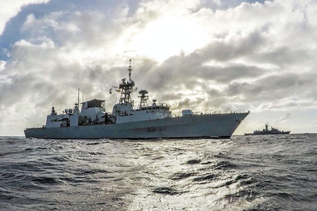 HMCS Vancouver (left) and Her Majesty’s Australian Ship Toowoomba (right) align during Operation Projection Asia Pacific in the Timor Sea