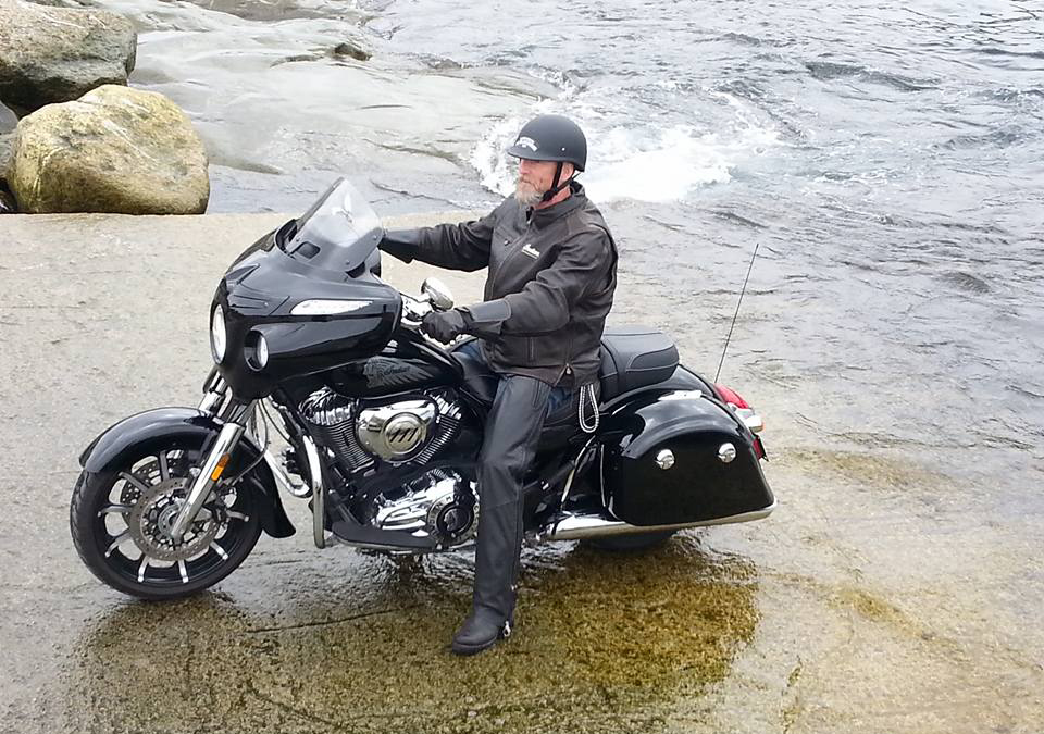 Corporal Retired Scott Casey dips his rear tire in the waters of the Atlantic Ocean at the start of last year’s Rolling Barrage.