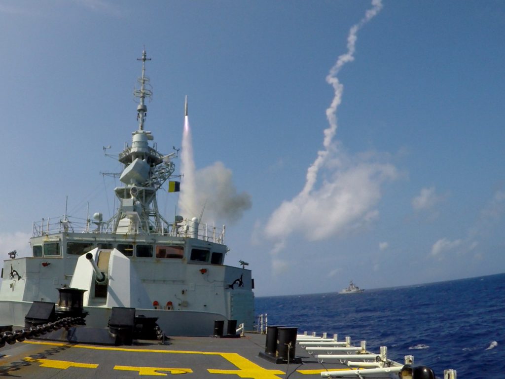 HMCS Vancouver fires an Evolved Sea Sparrow Missile during a missile exercise while the ship participates in RIMPAC. In the background is Her Majesty’s Australian Ship (HMAS) Toowoomba. Photo by Lt(N) Tony Wright