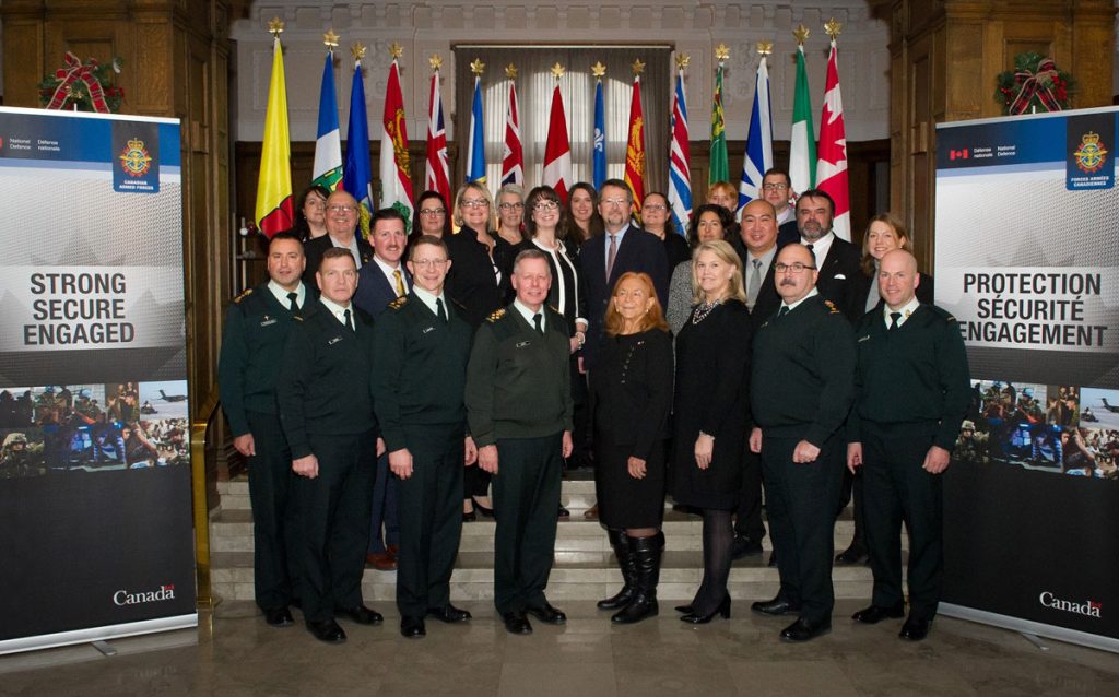 Members of Seamless in Canada pose for a group photo at the Chateau Laurier in Ottawa