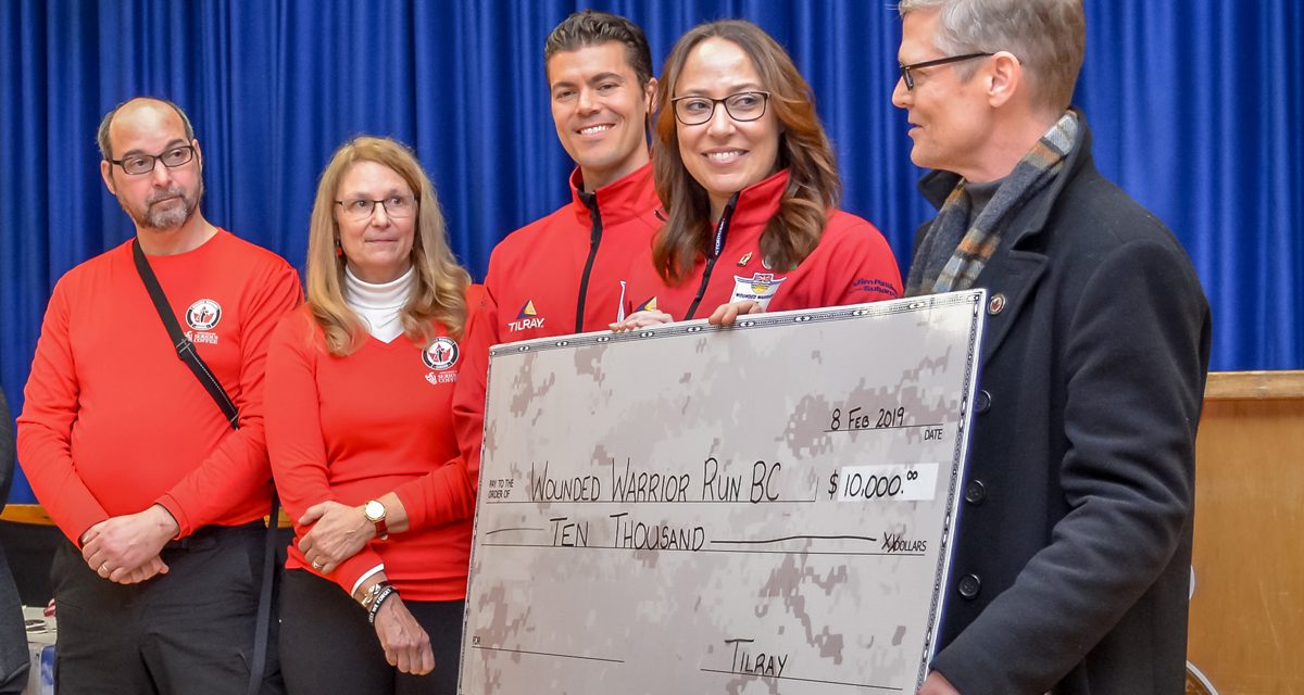 Two DND employees prepare for Wounded Warrior relay