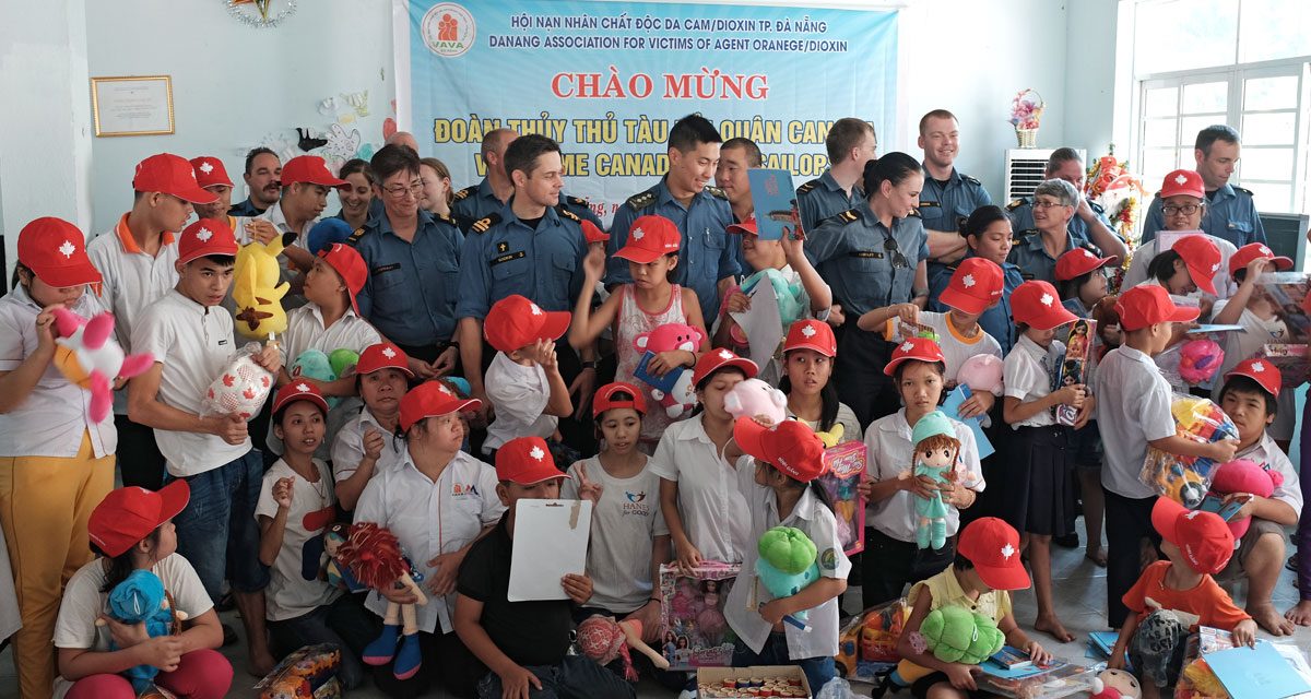 Sailors pitch in to build classrooms