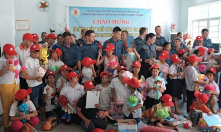 Sailors pitch in to build classrooms