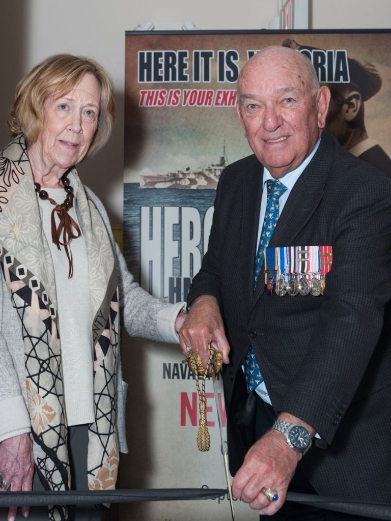 Deborah Cotton and Commodore (Retired) Doug Mclean cut the HMCS Beacon Hill exhibit ribbon.  Photo by LS Gibson