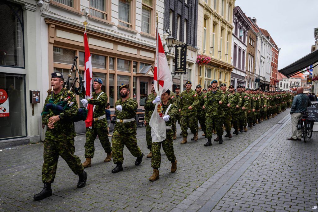 Members of the Canadian Armed Forces Nijmegen Contingent march in ranks through the streets of Bergen Op Zoom