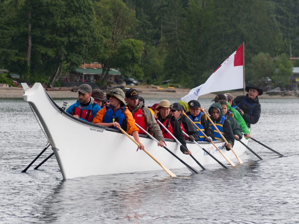 The Royal Canadian Navy canoe family embarks on a leg of the Pulling Together 2019 Canoe Journey at Willingdon Beach near Powell River. Photos by LS Brendan Gibson