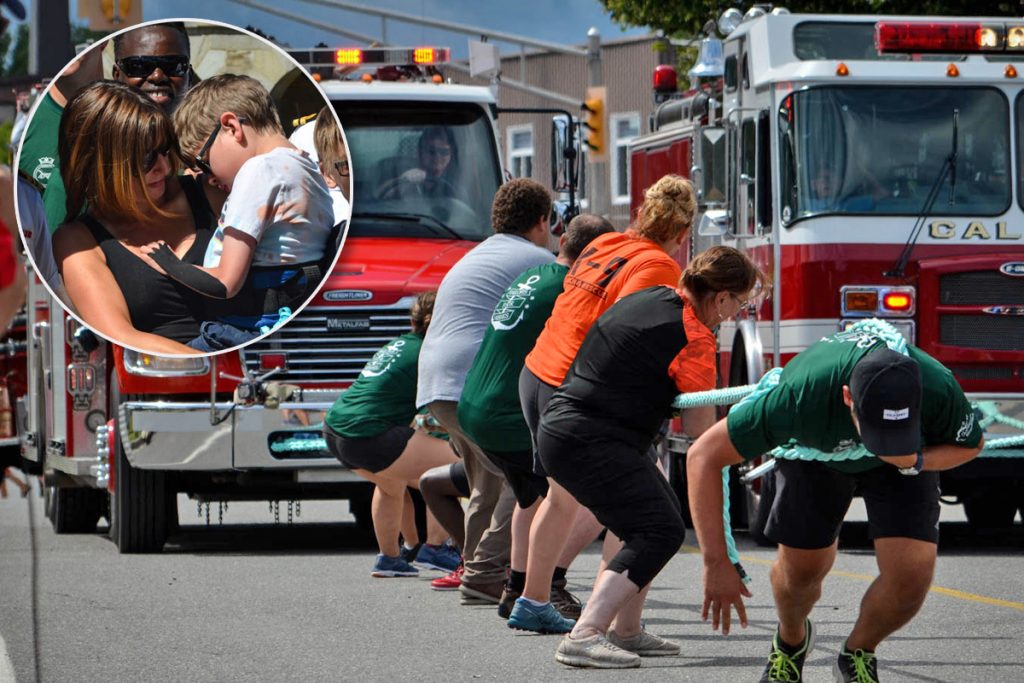 A team from HMCS Fredericton’s crew (green shirts)