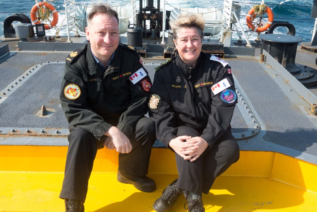 Siblings PO2 Thomas Hertel and Capt Monica Phillips on HMCS Ottawa’s quarterdeck. Photo by Capt Jen Jackson
