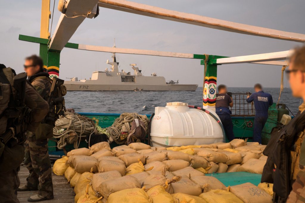FS Courbet’s boarding party with some of the 3.5 metric tonnes of hashish seized from a dhow in the Gulf of Oman on 13 December