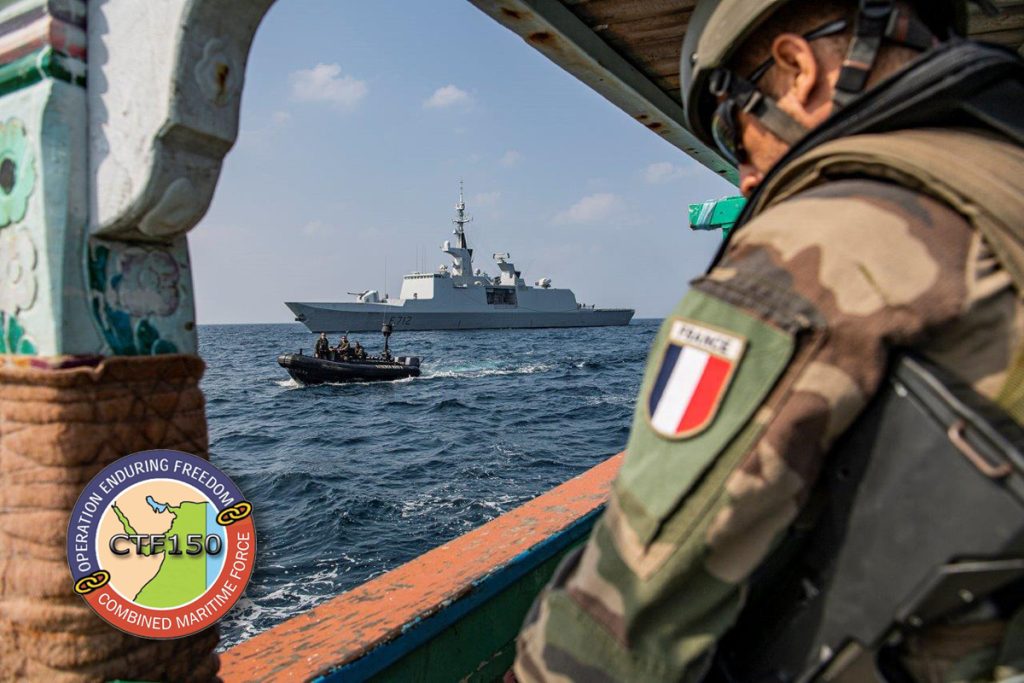 FS Courbet’s boarding team searches a dhow in the Gulf of Oman while the ship stays close. Courbet’s boarding team found and seized 1.5 metric tonnes of hashish from this vessel. The estimated regional wholesale value of the drugs was $780