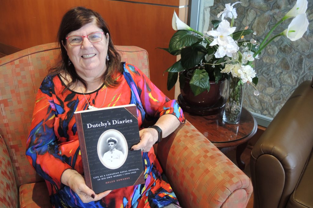 Author Helen Edwards poses with a copy of her book Dutchy’s Diaries. The book focuses on the life and times of her father-in-law Commodore John Crispo Inglis Edwards of the Royal Canadian Navy and his travels from 1916 to 1929. Edwards will hold her book launch at the Wardroom on Feb. 18.