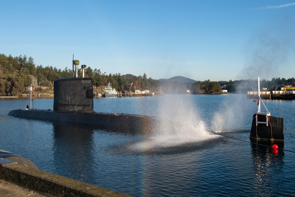 HMCS Victoria conducts one of three camber dives off F jetty as part of the submarine’s work ups to readiness.  Photo by Leading Seaman Mike Goluboff
