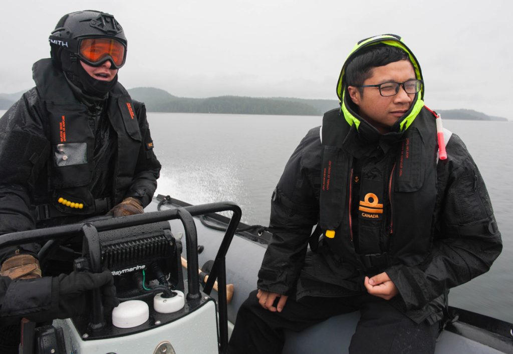 Leading Seaman Kayla Ruiz and Lieutenant (Navy) Miguel Perez conduct a maritime domain awareness patrol. Photo by Leading Seaman Brendan Gibson