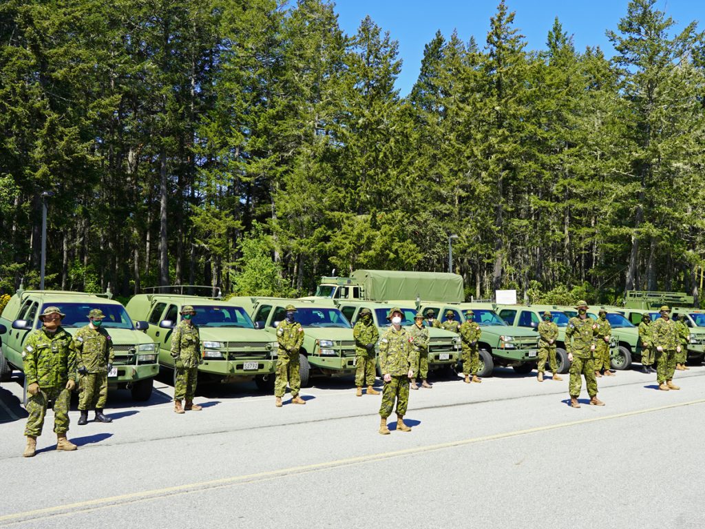 A platoon from Land Task Force Vancouver Island’s Domestic Response Company assemble at Canadian Forces Ammunition Depot Rocky Point before returning to base May 6. Photo by Capt Jeff Manney