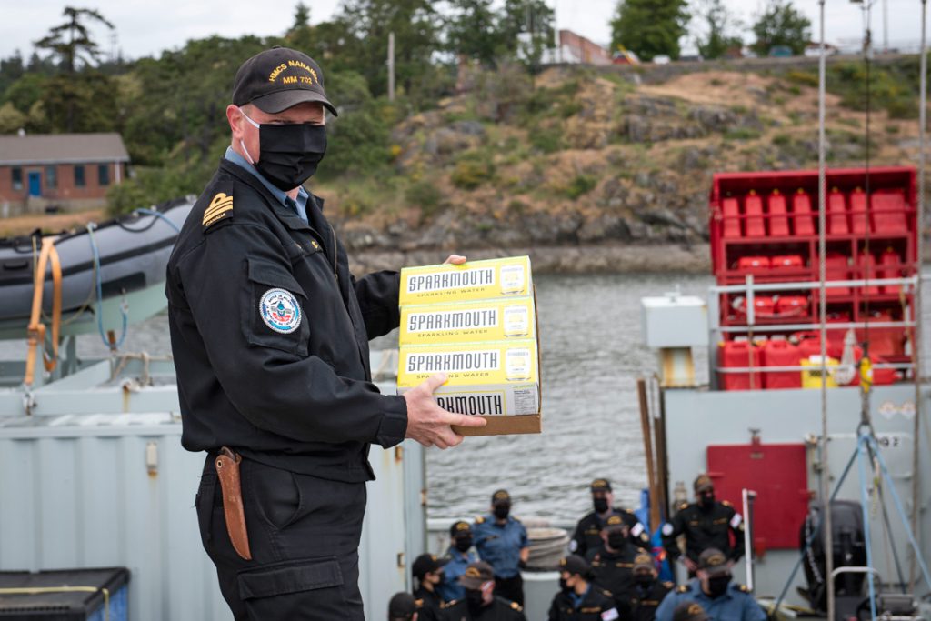 HMCS Nanaimo returned from Operation Laser May 22. Members of the crew received SPARKMOUTH drinks as they disembarked. Photo by Leading Seaman Valerie LeClair