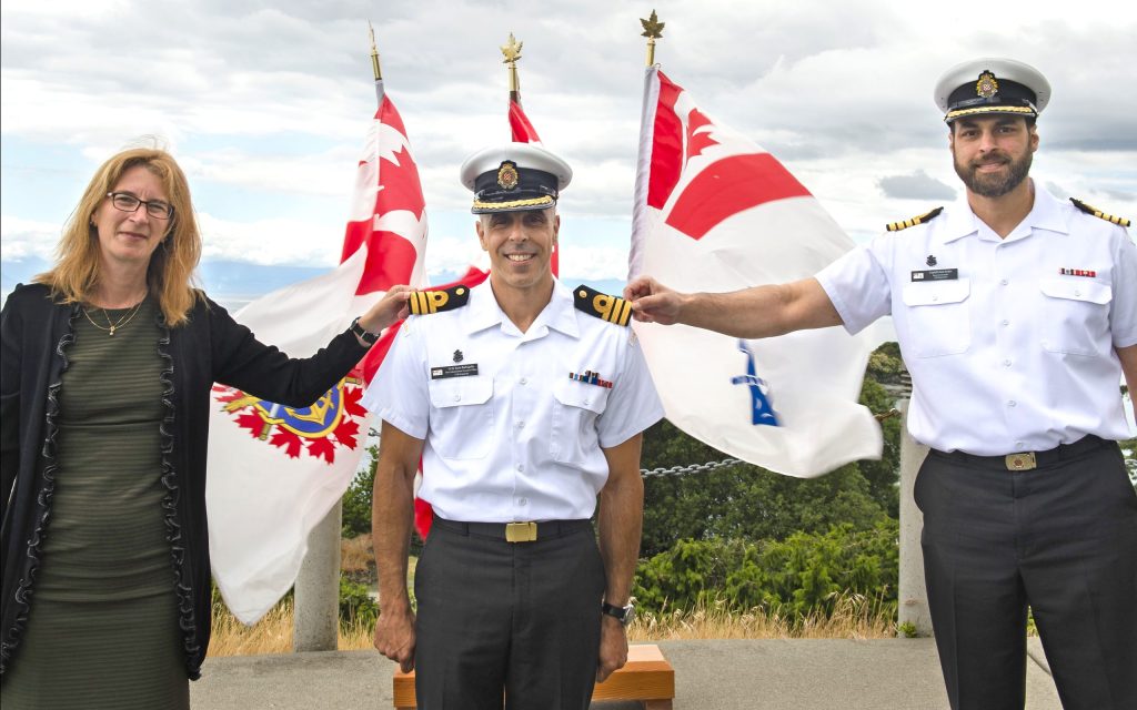 Commander Jason Barbagallo (middle)