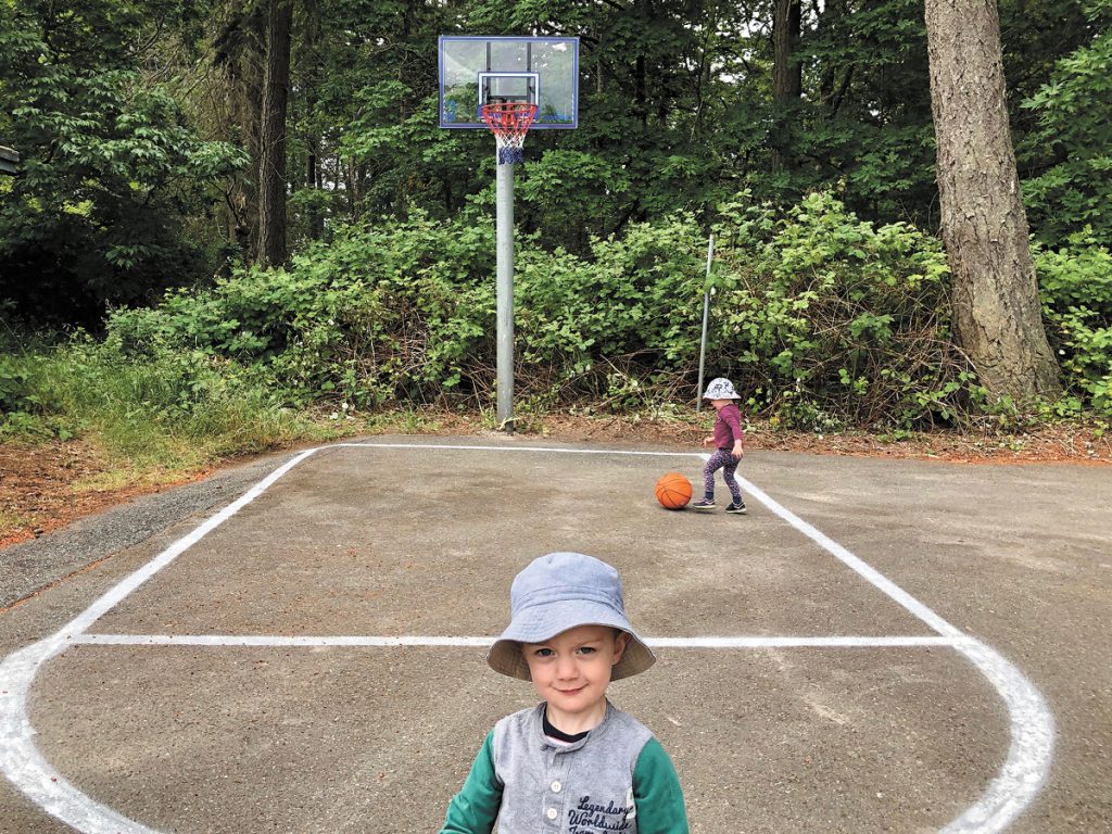 Three-year-old Oliver Forbes (foreground) and his sister