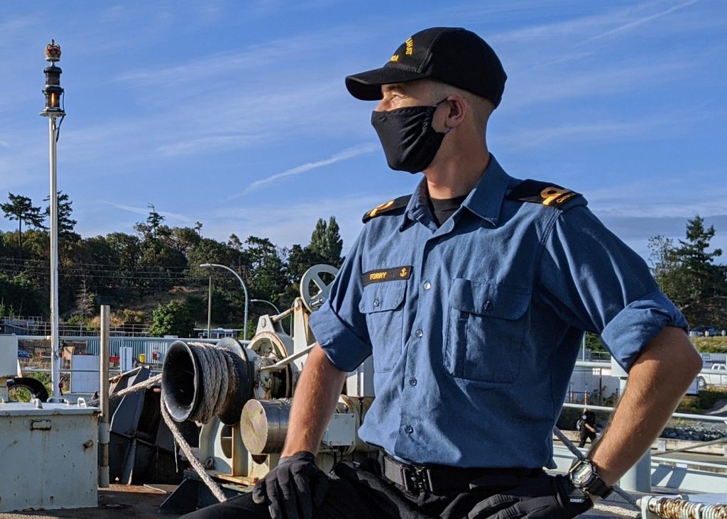 A/SLt Forry on the deck of HMCS Yellowknife during its cold move in July.