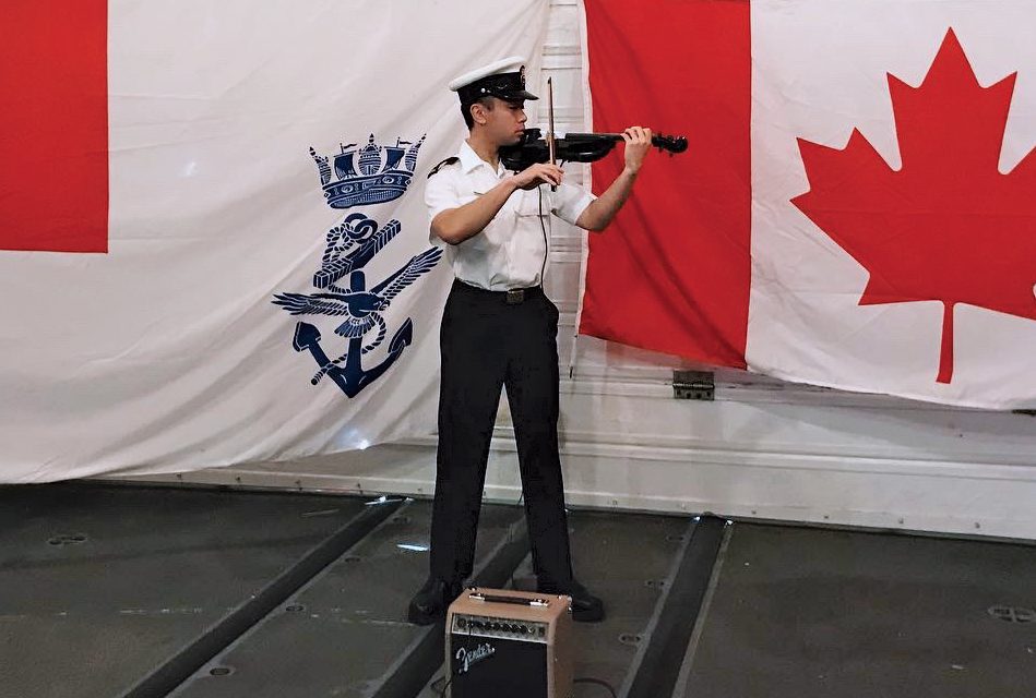 Navy Violinist Soothes Sailors At Sea