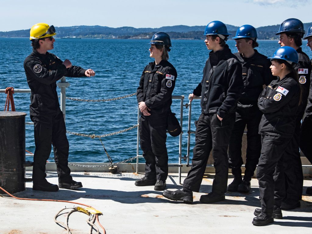 Crew members of the Motor Vessel (MV) Asterix perform a Replenishment-At-Sea (RAS) Layout