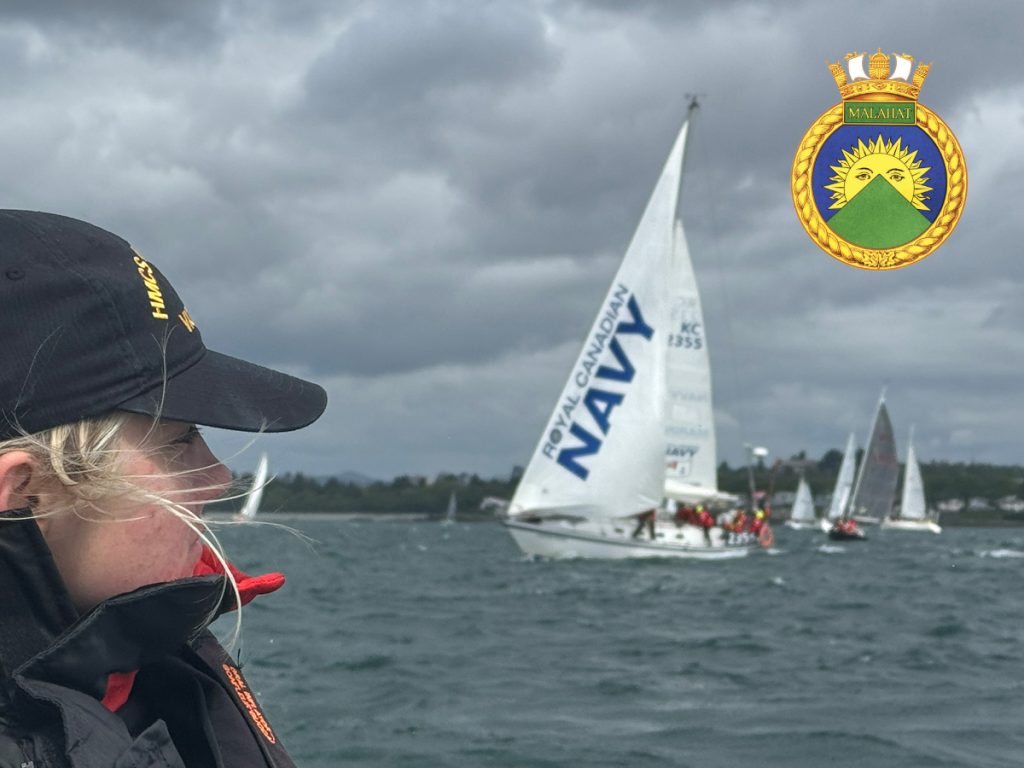 Sailor 3rd Class Isabelle Maguet of HMCS Malahat keeps a close eye on the 135 boats at the start line of the 79th Swiftsure Yacht Race