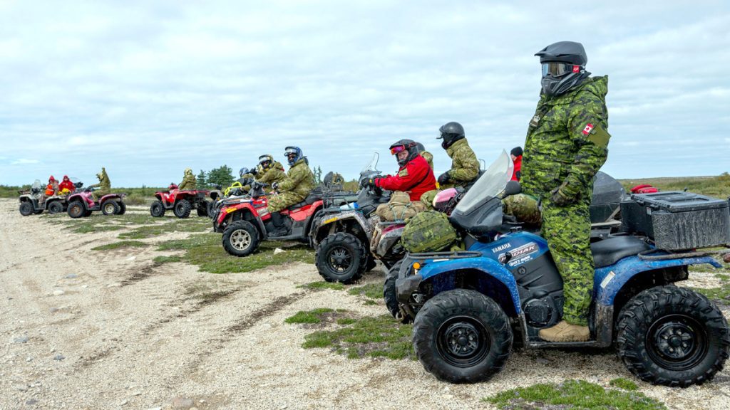 Members of the 4th Canadian Ranger Patrol Group and the Australian Defence Force’s North West Mobile Force prepare to depart for a patrol exercise during Exercise Northern Lights 24.