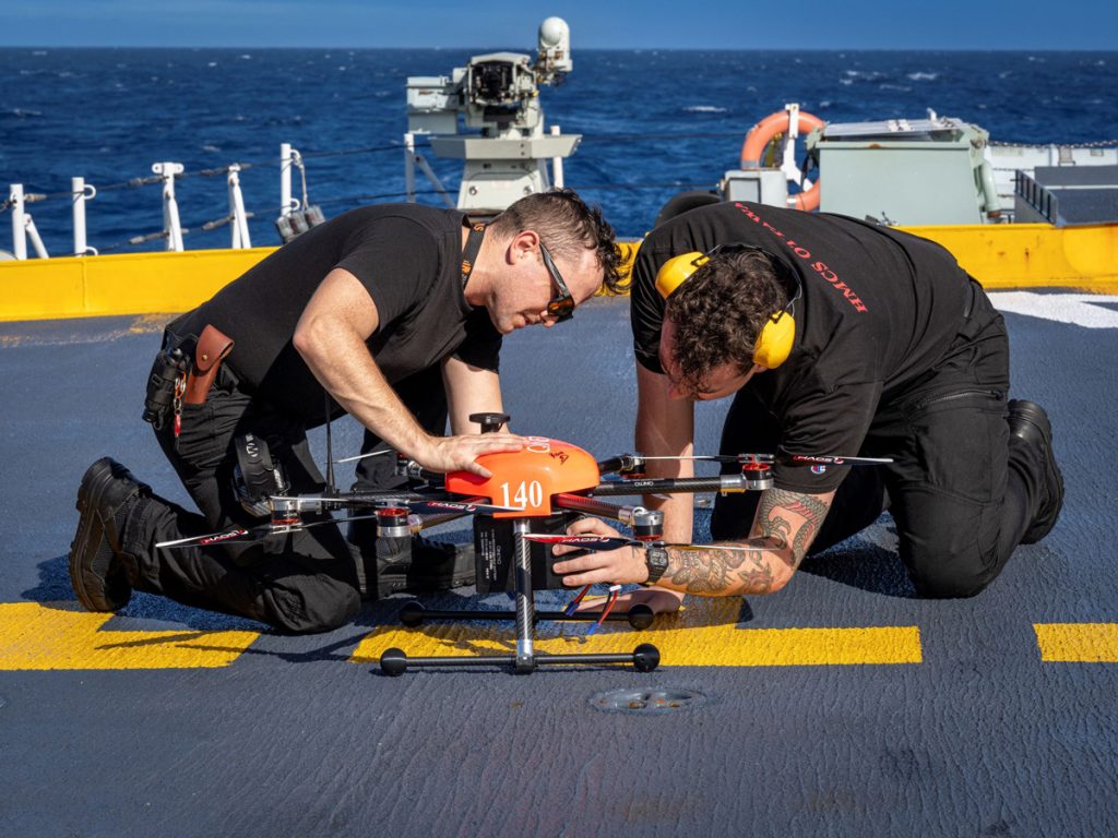 Members of the Advanced Naval Capabilities Unit showcase collaboration and innovation with the use of an uncrewed air vehicles.